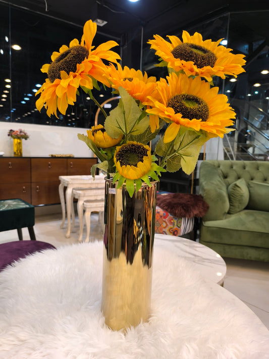 Metal vase with sunflowers